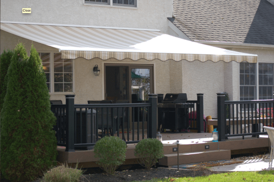 Motorized awnings vs. manual awnings