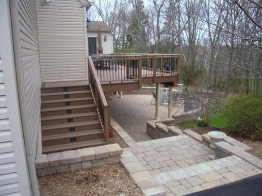 deck and stone patio combination