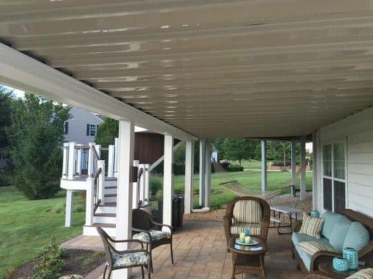 deck and stone patio combination